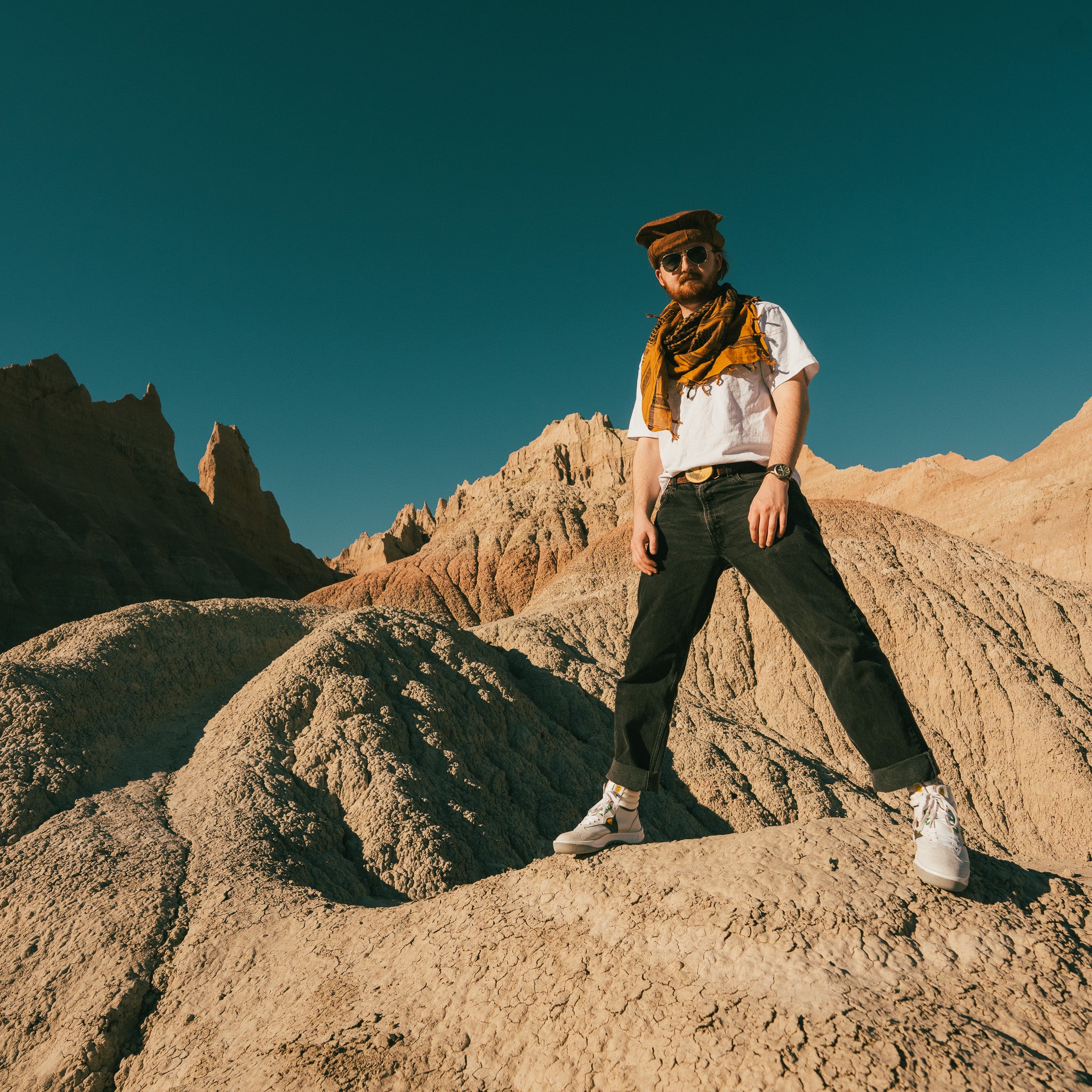 White Servis Cheetah High Top Sneakers