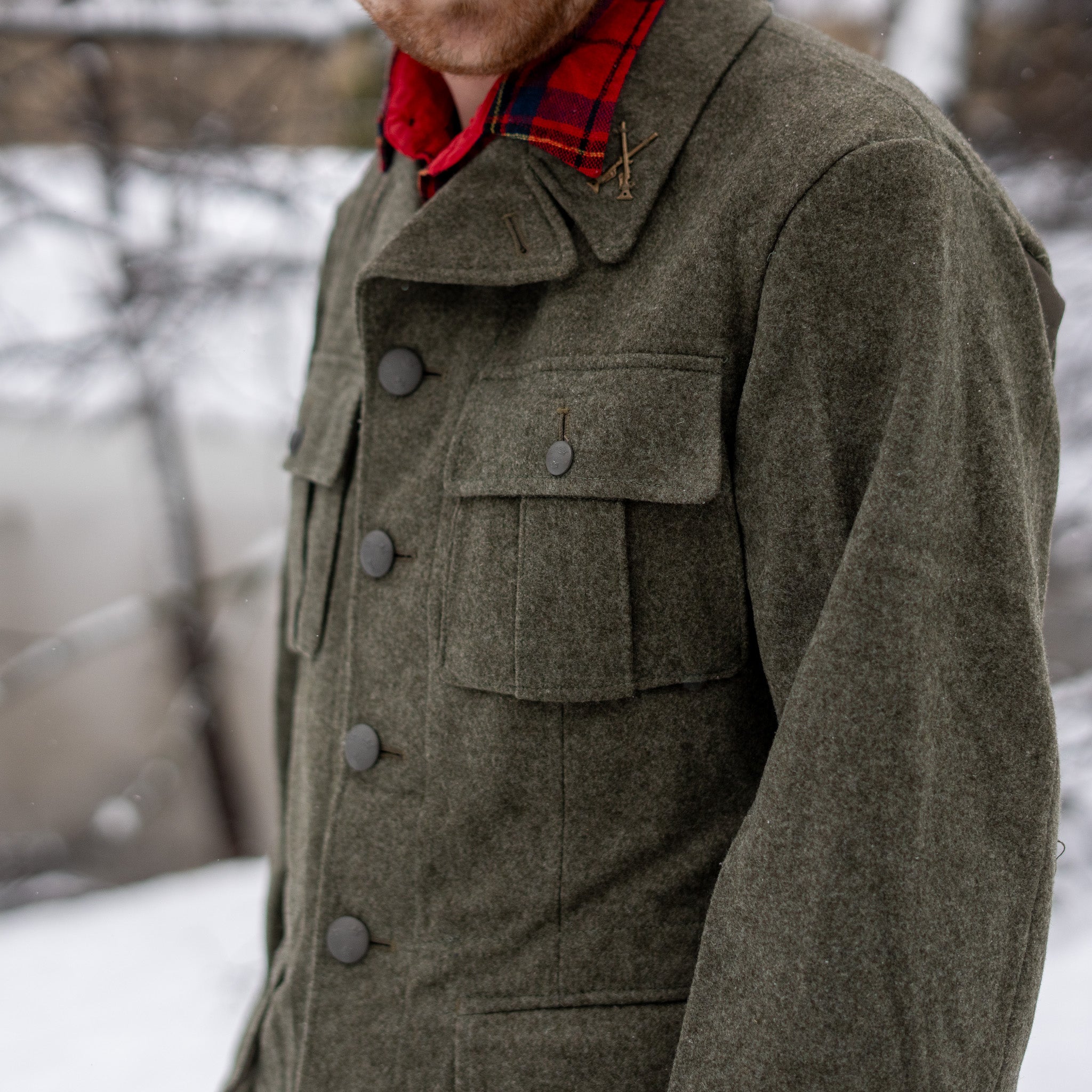 Close up of man wearing Swedish wool field jacket